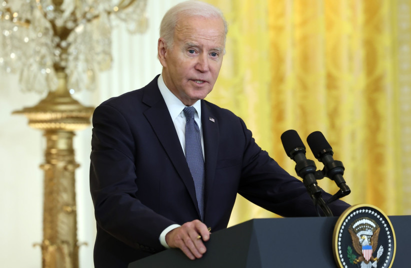  President Joe Biden answers a question during a joint press conference with French President Emmanuel Macron at the White House during an official state visit (photo credit: KEVIN DIETSCH/GETTY IMAGES)