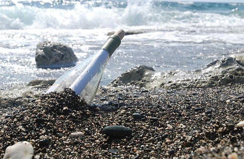  Illustration of a message in a bottle (photo credit: Wikimedia Commons)