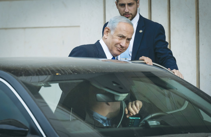  BENJAMIN NETANYAHU leaves after holding coalition talks at a hotel in Jerusalem on Wednesday.  (credit: YONATHAN SINDEL/FLASH90)