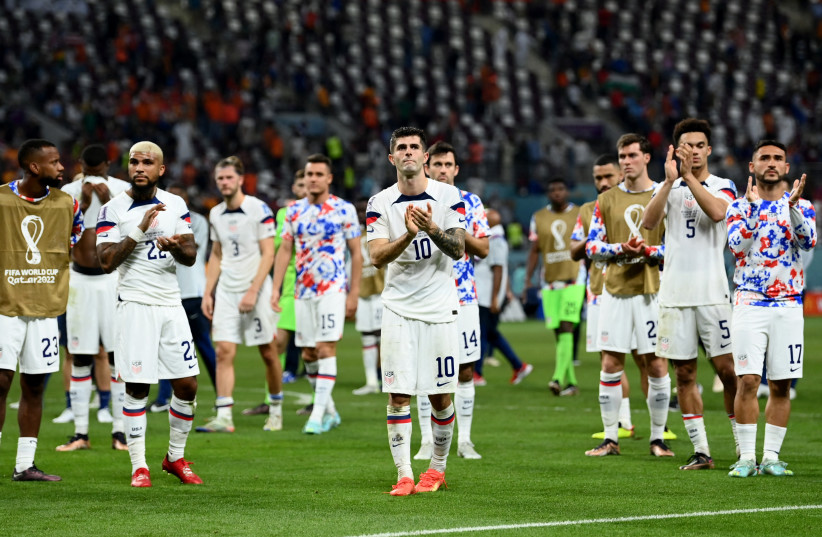  Soccer Football - FIFA World Cup Qatar 2022 - Round of 16 - Netherlands v United States - Khalifa International Stadium, Doha, Qatar - December 3, 2022 United States players applaud fans after the match as United States are eliminated from the World Cup  (credit: REUTERS/ANNEGRET HILSE)