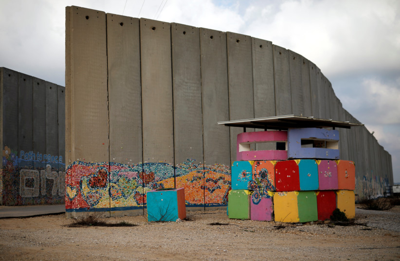 An IDF army post is seen next to a concrete wall inside the Israeli farming community of Netiv Haasara, just outside Gaza Strip by the Israeli side of the Israel-Gaza border (credit: REUTERS/AMIR COHEN)