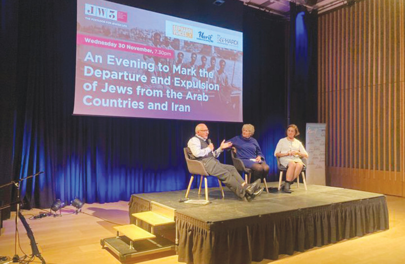  A PANEL discussion takes place at the November 30 commemoration in London, chaired by the writer (center), and featuring Jack Hikmet and Sharon Theodore, who both lived in Baghdad at the time of the 1969 hangings.  (photo credit: Michelle Huberman)