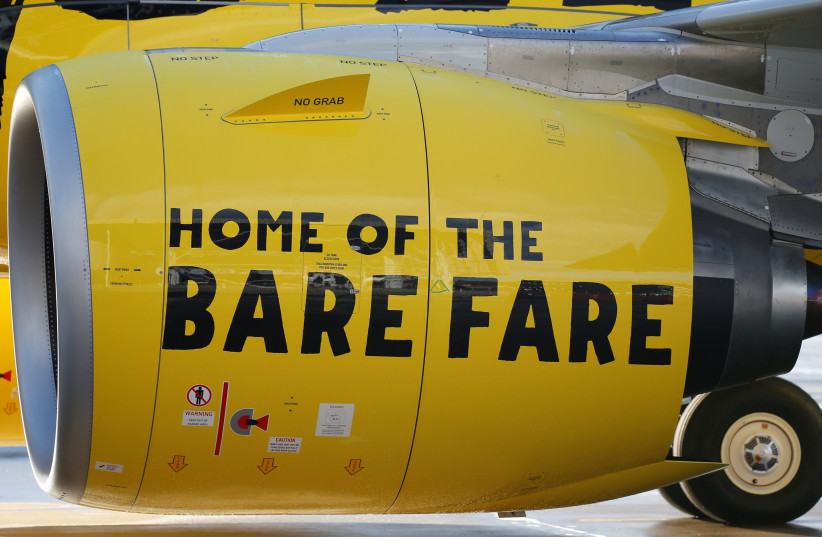  A slogan of low cost carrier Spirit Airlines is pictured on an engine in Colomiers near Toulouse, France, November 6, 2018 (credit: REUTERS/REGIS DUVIGNAU)