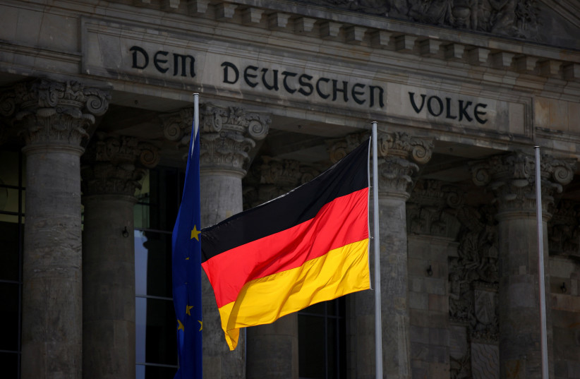  The German national flag flies in front of Reichstag building in Berlin (photo credit: REUTERS)