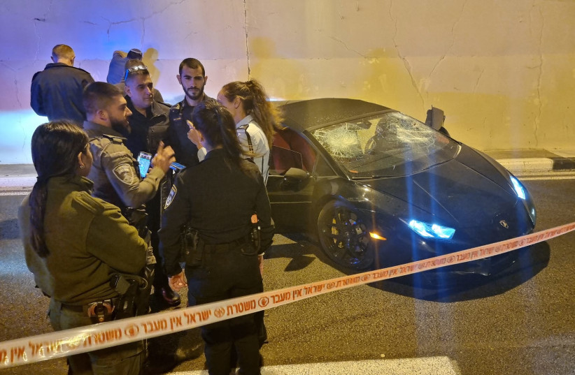  Israeli security forces investigate the scene after two east Jerusalem residents were shot at in their car on Highway 6 near Ben Shemen Junction just after midnight on December 6.  (credit: ISRAEL POLICE)