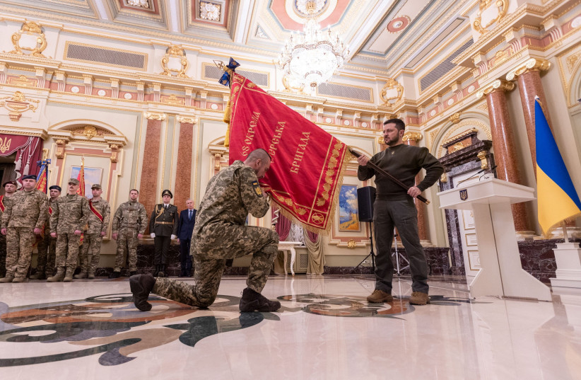  Ukraine's President Volodymyr Zelensky attends an award ceremony of a battle banner to one of Army brigades in the Day of the Ukrainian Armed Forces, amid Russia's attack on Ukraine, in Kyiv, Ukraine December 6, 2022. (credit: Ukrainian Presidential Press Service/Handout via REUTERS)