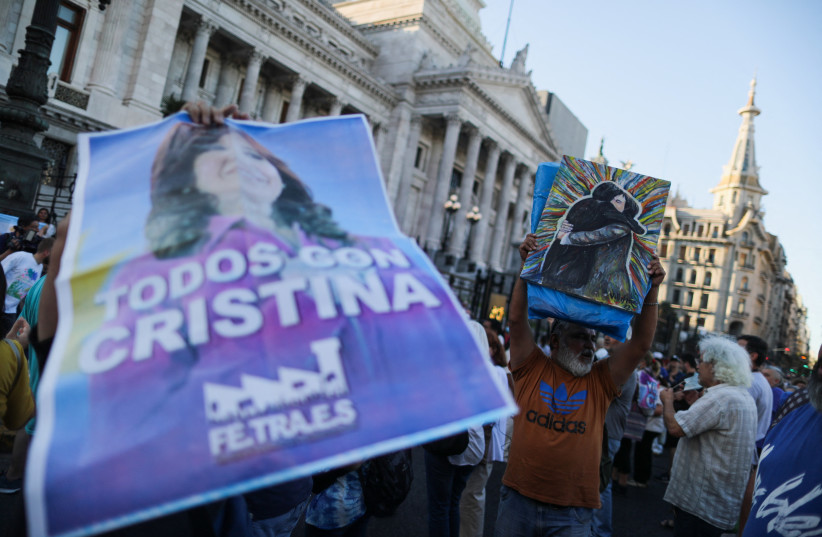  Supporters of Argentine Vice President Cristina Fernandez de Kirchner protest outside the National Congress after a federal court found her guilty in a corruption case, in Buenos Aires, Argentina December 6, 2022. (credit: AGUSTIN MARCARIAN/REUTERS)