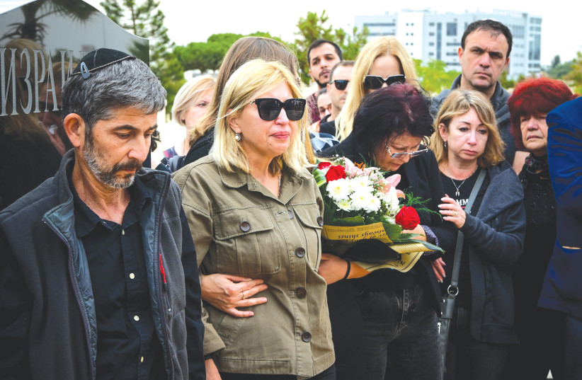  THE FUNERAL of Yuri Volkov, stabbed to death during a road rage incident, takes place at a Holon cemetery last week.  (photo credit: AVSHALOM SASSONI/FLASH90)