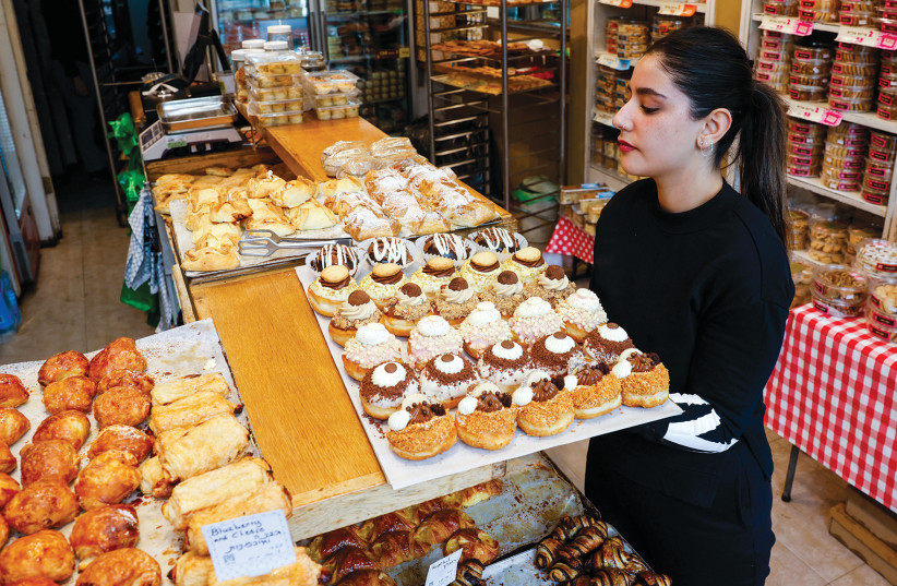  Hanukkah donuts (sufganiyot) up for sale at English Cake bakery in Jerusalem. (credit: MARC ISRAEL SELLEM/THE JERUSALEM POST)