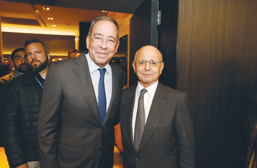  US AMBASSADOR Tom Nides (front left) with the head of the Dan Hotels chain, Michael Federmann. (photo credit: GUY YEHIELI)