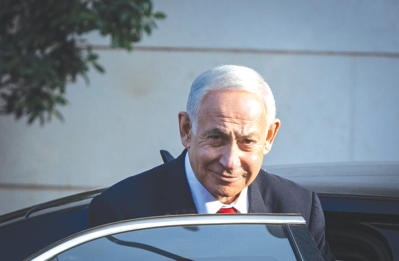  LIKUD HEAD Benjamin Netanyahu leaves coalition talks with Shas chairman Arye Deri and Religious Zionist Party head Bezalel Smotrich in Jerusalem on Monday. (photo credit: YONATAN SINDEL/FLASH90)