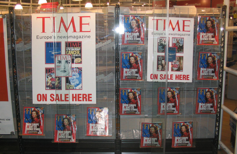  Shop window at Munich Airport featuring promotions for TIME magazine (2004). (credit: Sandra.savaglio via WIKIMEDIA COMMONS)