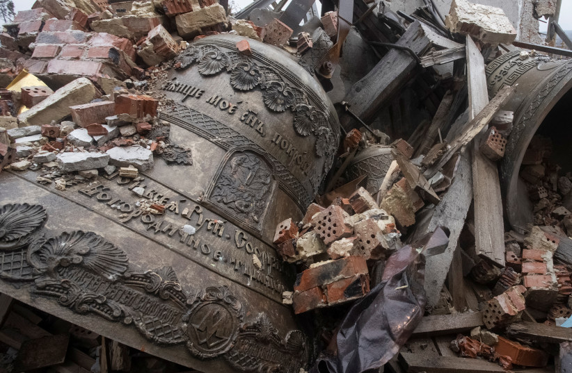  Bells are seen surrounded by debris of a destroyed Orthodox church, amid Russia's attack on Ukraine, in the village of Bohorodychne in Donetsk region, Ukraine December 8, 2022.  (credit: Yevhen Titov/Reuters)