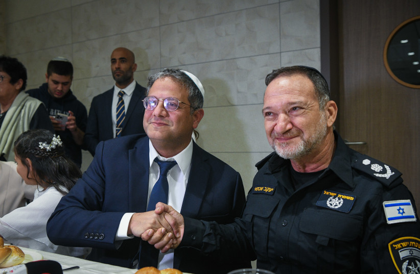  Head of the Otzma Yehudit party MK Itamar Ben Gvir and Chief of Police Kobi Shabtai at Itamar Ben-Gvir's daughter's Bat Mitzvah ceremony in Kiryat Arba, December 8, 2022. (credit: ARIE LEIB ABRAMS/FLASH 90)