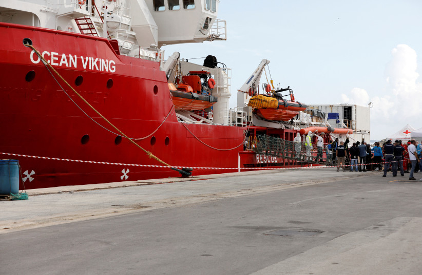  Migrants disembark at the port of Pozzallo after spending nearly two weeks on board the Medecins Sans Frontieres (MSF)-operated Ocean Viking (photo credit: REUTERS)