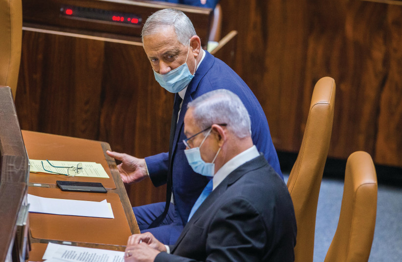  THEN-PRIME Minister Benjamin Netanyahu and Defense Minister Benny Gantz sit in the Knesset plenum, in 2020. ‘The ephemeral ministries concocted for the Netanyahu-Gantz government are infamous,’ says the writer (photo credit: OREN BEN HAKOON/FLASH90)