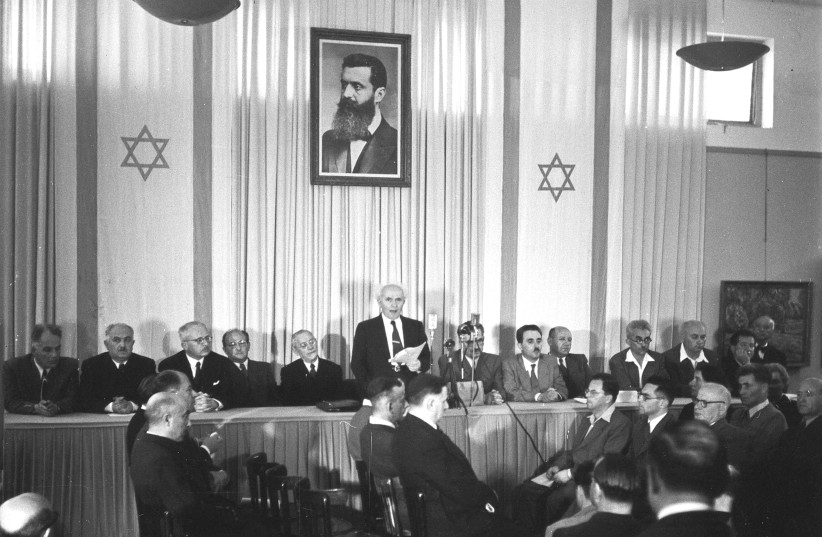 FIRST PRIME MINISTER David Ben-Gurion reads Israel’s Declaration of Independence in Tel Aviv, on May 14, 1948 (photo credit: GPO)