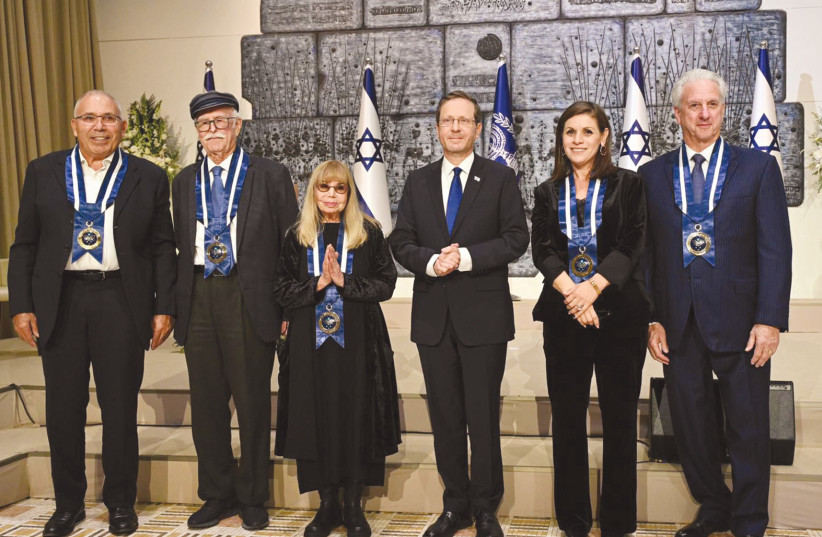  PRESIDENT ISAAC HERZOG with recipients of the President’s Medal of Honor (from left): Pinchas Buchris, Chaim Peri, Rachel Shapira Dr. Dalia Fadila and Michael Siegal. (credit: HAIM ZACH/GPO)