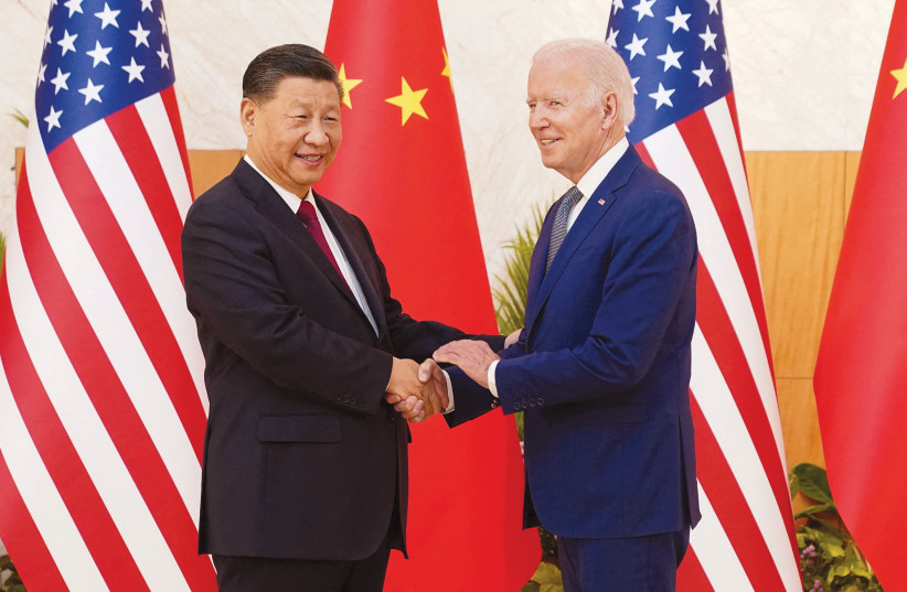  US PRESIDENT Joe Biden shakes hands with Chinese President Xi Jinping at their meeting on the sidelines of the G20 summit in Bali, Indonesia, last month. (photo credit: KEVIN LAMARQUE/REUTERS)