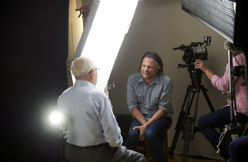 Martin Schoeller interviews a Holocaust survivor as part of his "Survivors: Faces of Life after the Holocaust" project. (photo credit: Museum of Jewish Heritage – A Living Memorial to the Holocaust)
