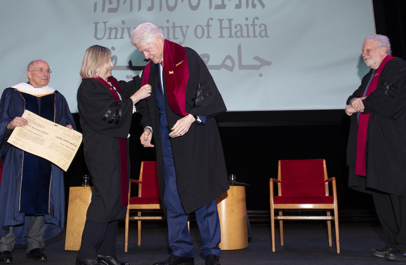 President Bill Clinton receives an honorary doctorate from University of Haifa. (photo credit: ELENA OLIVO)