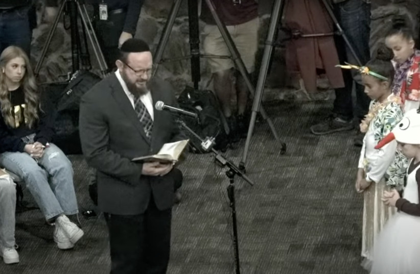 Mark Aaron Griffin, a Messianic "rabbi" awaiting trial on four counts of sexual assault, leads the opening prayer at Keller Independent School District's board meeting, Dec. 12, 2022. (photo credit: screenshot)