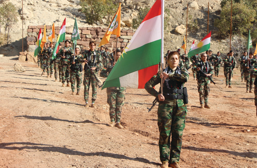  PAK FIGHTERS at their base in Pirde, Kirkuk Province.  (photo credit: JONATHAN SPYER)