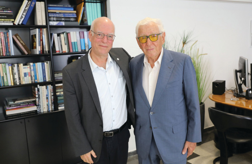  TEL AVIV University president Ariel Porat (left) with Sir Frank Lowy. (photo credit: COURTESY TAU)