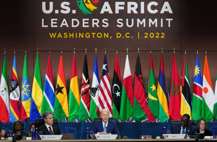  U.S. Secretary of State Antony Blinken listens as U.S. President Joe Biden addresses the U.S.-Africa Summit Leaders Session on partnering on the African Union’s Agenda 2063, in Washington, U.S., December 15, 2022. (photo credit: KEVIN LAMARQUE/REUTERS)