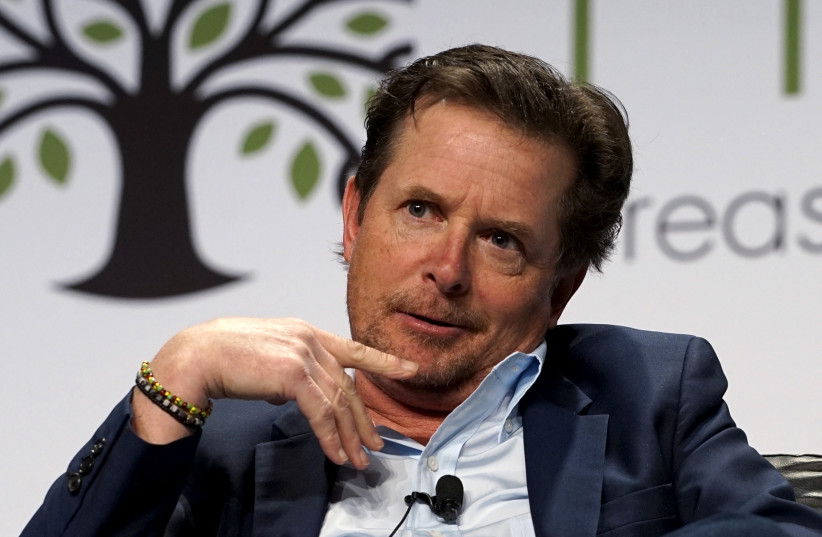  Actor Michael J. Fox speaks during a panel discussion on Parkinson's disease during lunch at the annual Skybridge Alternatives Conference (SALT) in Las Vegas May 6, 2015. Fox was diagnosed with young-onset Parkinson's disease in 1991. (credit: RICK WILKING/REUTERS)