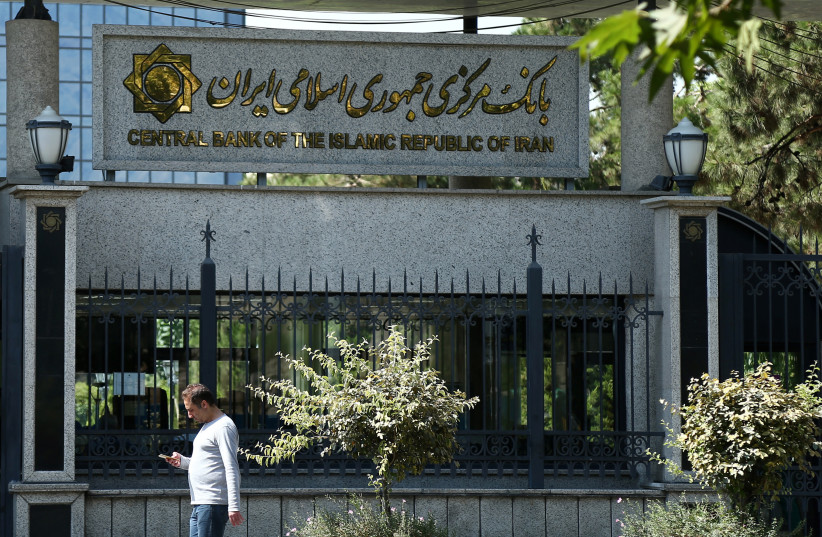 A man walks past the Central Bank of Iran in Tehran, Iran August 1, 2019. (photo credit: NAZANIN TABATABAEE/WANA (WEST ASIA NEWS AGENCY) VIA REUTERS)