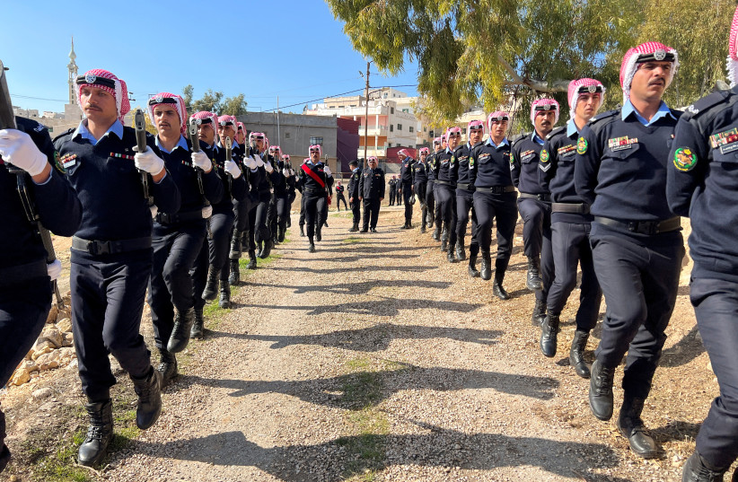  Jordanian security personnel attend the funeral of senior police officer who was killed in riots on Thursday night according to authorities, in Jerash, Jordan December 16, 2022.  (credit: REUTERS/JEHAD SHELBAK)