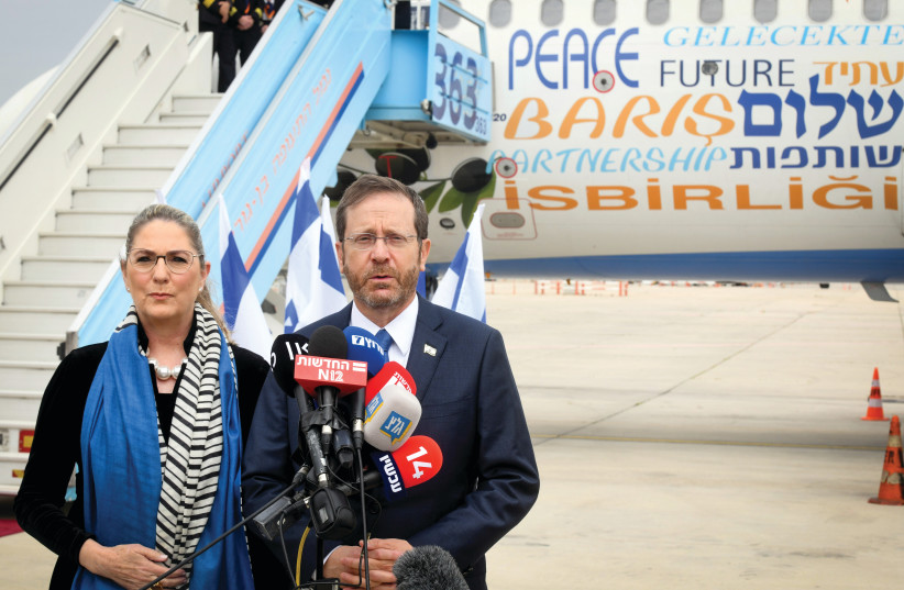  PRESIDENT ISAAC Herzog, with his wife Michal at his side, delivers a statement at Ben-Gurion Airport, before departing for a state visit to Turkey, in March. (photo credit: YOSSI ZELIGER/FLASH90)