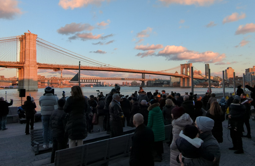  A crowd gathers for a Menorah lighting at Seaport in downtown Manhattan, NYC. (photo credit: COURTESY/Rabbi Yitzchok Moully)
