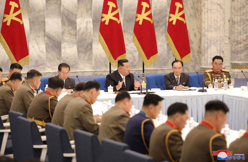  North Korean leader Kim Jong Un attends a convocation of the Expansion of the Central Military Commission of the Workers' Party of Korea in this photo released by the country's Korean Central News Agency on June 22, 2022. (photo credit: KCNA VIA REUTERS)