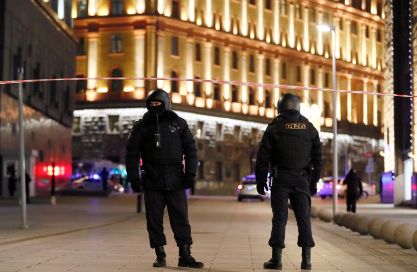  Security officers block a street near the Federal Security Service (FSB) building after a shooting incident, in Moscow, Russia December 19, 2019.  (credit: REUTERS/SHAMIL ZHUMATOV)