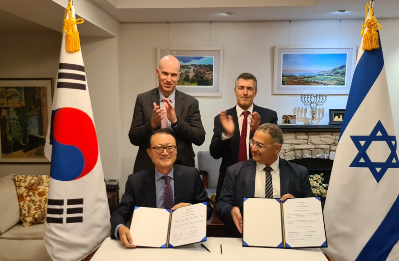   (back left) Israel’s former economic attaché in Korea Yaniv Goldberg, (front left) Dreamstone Partners Chairman Mr. Yang Seungwoo, (front right) Founder & CEO of Airovation Technologies Marat Maayan and (back right) Ambassador Akiva Tor at the Ambassador's residence in Seoul. (credit: Courtesy)