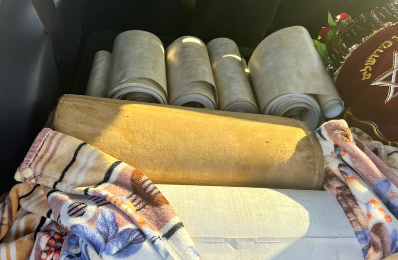   The recovered Torah scrolls in Rishon Lezion. (photo credit: POLICE SPOKESPERSON'S UNIT)