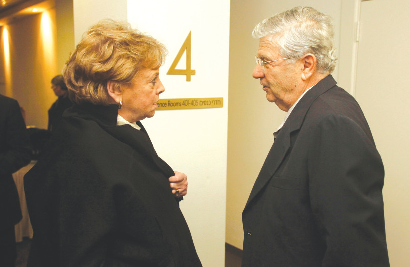  THEN-SUPREME Court president Dorit Beinisch chats with her predecessor, Aharon Barak, at a law conference in Jerusalem, 2010 (photo credit: YOSSI ZAMIR/FLASH90)