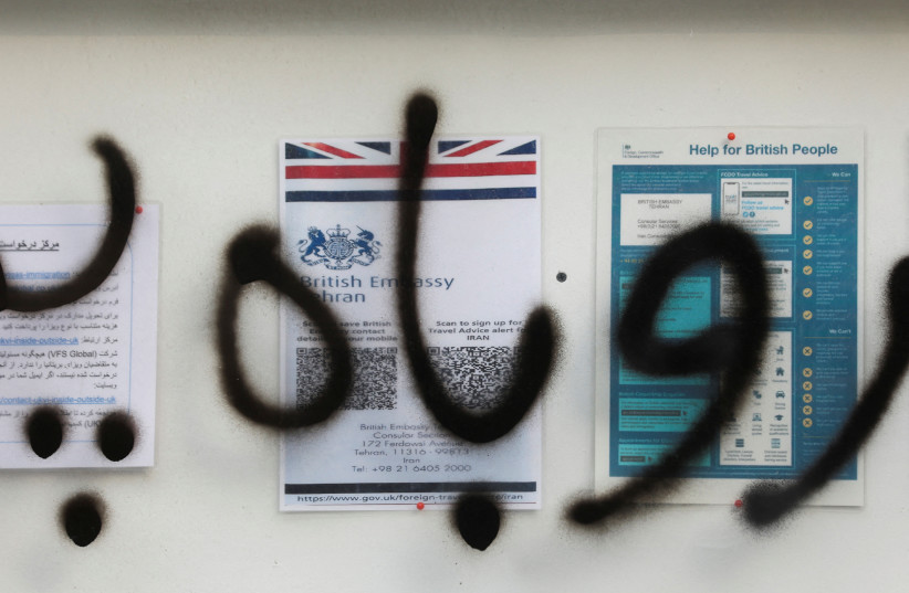 An anti-British graffiti is seen on the wall of the British Embassy in Tehran, Iran, December 10, 2022. (photo credit: MAJID ASGARIPOUR/WANA (WEST ASIA NEWS AGENCY) VIA REUTERS)