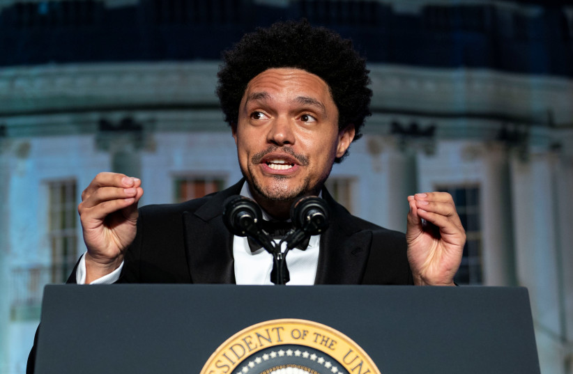 Trevor Noah, the host of Comedy Central's "The Daily Show", addresses the annual White House Correspondents Association Dinner in Washington, US, April 30, 2022. (photo credit: REUTERS/Al Drago)