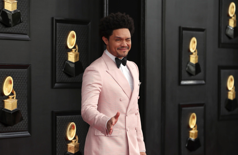 Show host Trevor Noah poses on the red carpet at the 64th Annual Grammy Awards at the MGM Grand Garden Arena in Las Vegas, Nevada, US, April 3, 2022. (credit: REUTERS/MARIA ALEJANDRA CARDONA)