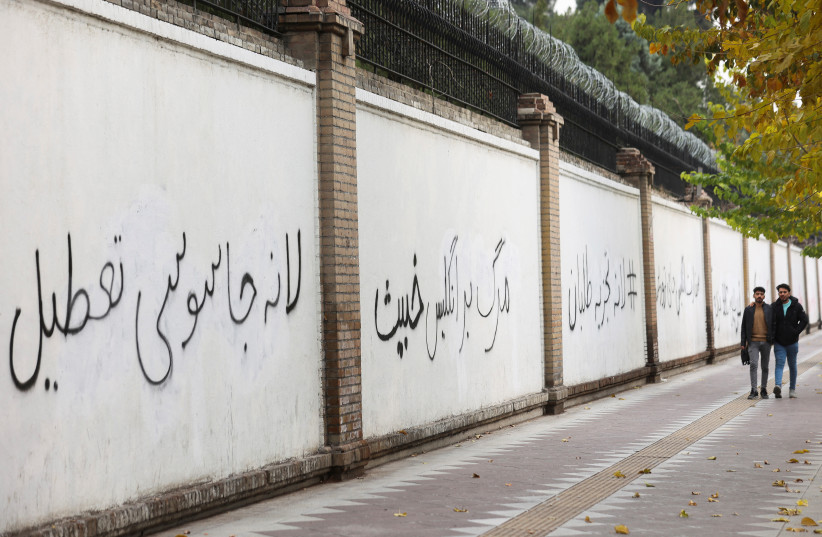  Anti-British graffities are seen on the walls of the British Embassy in Tehran, Iran December 10, 2022.  (photo credit: MAJID ASGARIPOUR/WANA)