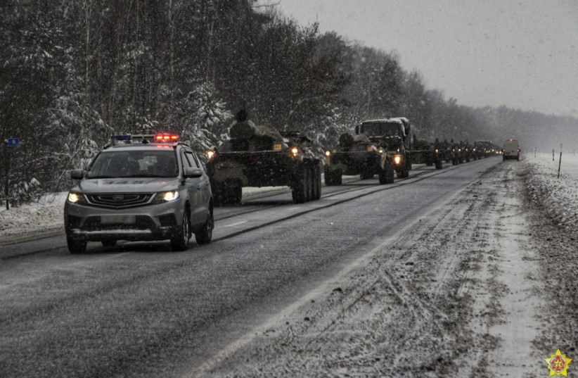  Service members of the 38th Brest Separate Guards Air Assault Brigade of the Belarusian armed forces drive vehicles during a snap inspection of troops' combat readiness at an unknown location in Belarus, in this handout picture released December 13, 2022. (photo credit: DMITRY BELETSKY/DEFENCE MINISTRY OF BELARUS/HANDOUT VIA REUTERS)