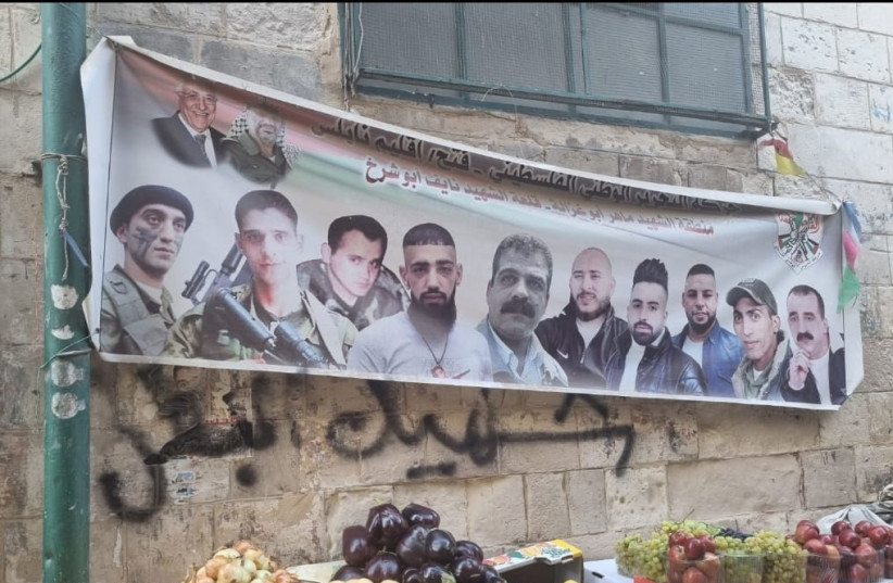  A banner in Nablus displaying the faces of deceased members of Fatah terrorist group. (photo credit: KHALED ABU TOAMEH)
