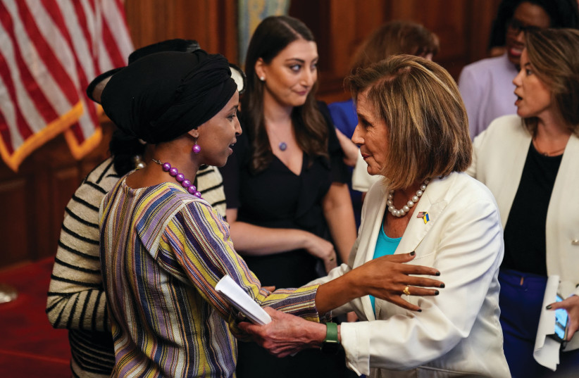  US HOUSE Speaker Nancy Pelosi greets Rep. Ilhan Omar on Capitol Hill. Even the Democratic House leadership, led by Pelosi, said that Omar had ‘engaged in deeply offensive antisemitic tropes.’  (photo credit: SARAH SILBIGER/REUTERS)