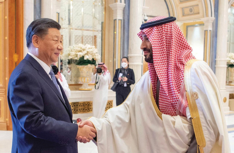  SAUDI CROWN Prince Mohammed bin Salman shakes hands with Chinese President Xi Jinping in Riyadh, earlier this month.  (photo credit: SAUDI PRESS AGENCY/REUTERS)