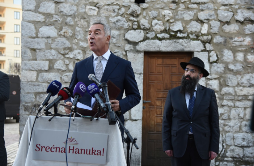 Montenegro's President Milo Đukanović attends Hanukkah lighting ceremony with Jewish community, December 21, 2022. (credit: MONTENEGRO JEWISH COMMUNITY)