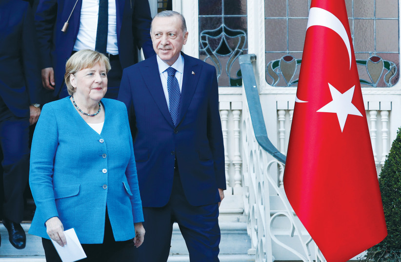  GERMANY’S FORMER chancellor Angela Merkel meets Turkish President Recep Tayyip Erdogan in Istanbul, last year. Merkel sanctioned the development of a fleet of modern submarines and other arms deals with Turkey, says the writer.  (credit: REUTERS/MURAD SEZER)