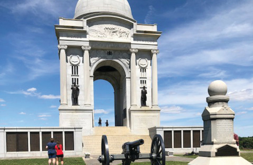  A CIVIL WAR cannon in front of a monument. (credit: BEN G. FRANK)